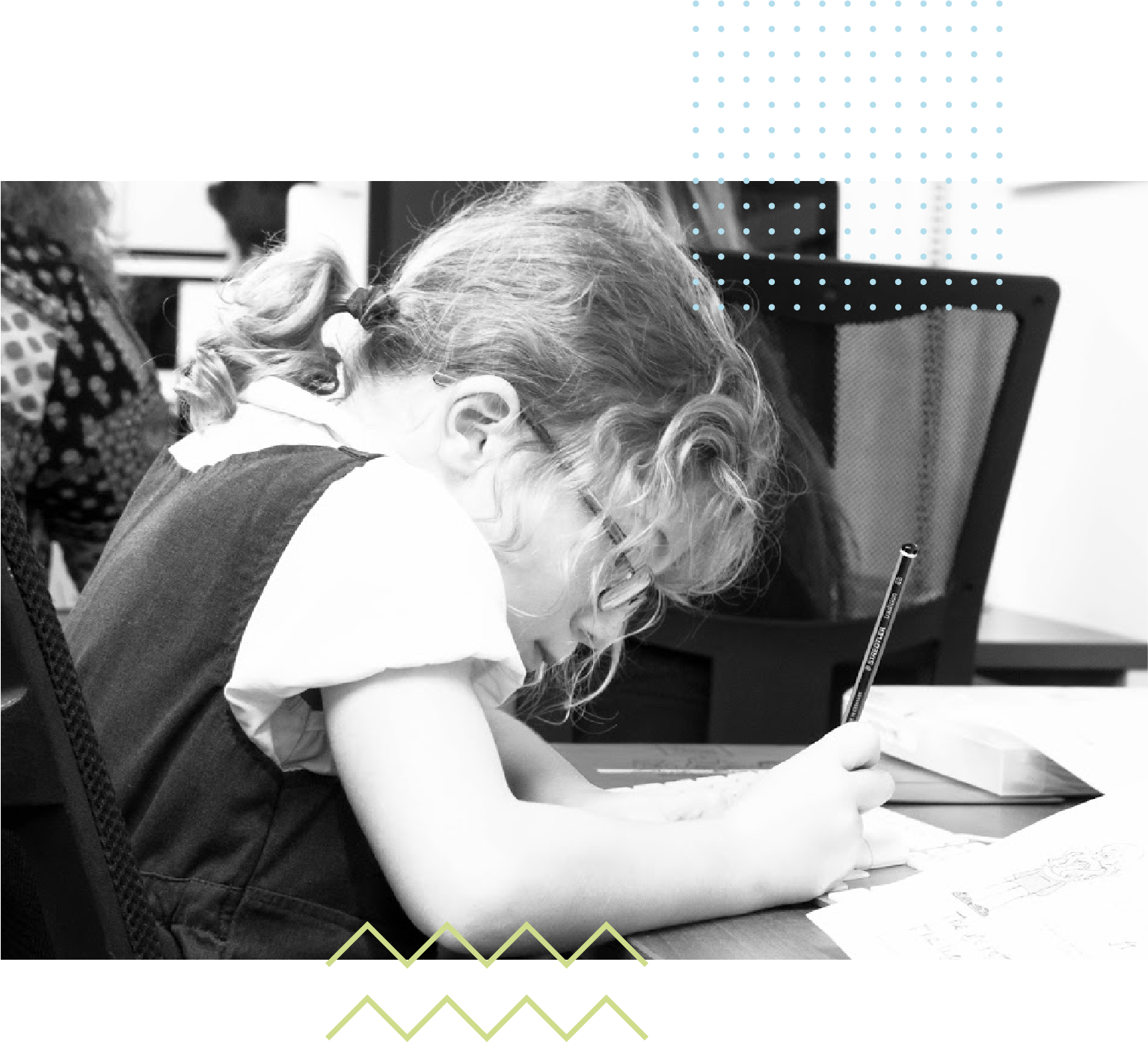 Student writing with pencil